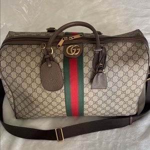 Ophidia GG medium carry-on duffle.